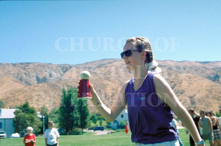 Claire participating in a sports game at the Sea Org picnic at Golden Era