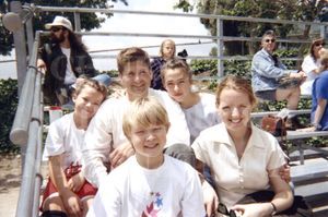 Marc and Claire taking family members out to a baseball game at a local park